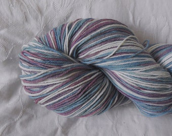 Aqua/mauve/white self-striping sock yarn