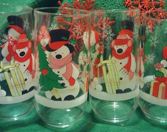 A Set of Four Colorful Holiday / Christmas Snowmen Tumblers / Juice Glasses
