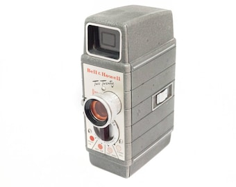 Bell and Howell Two Twenty 8mm movie camera with film inside