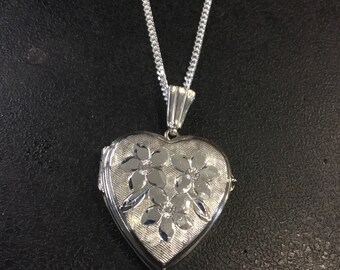 Silver heart locket on chain ,stamped GJltd