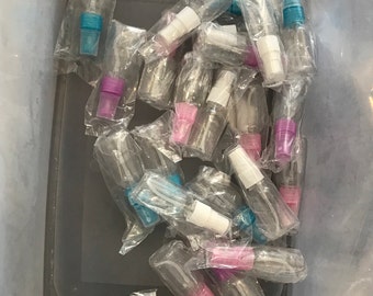 23 small spray bottles