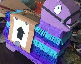 Super cute llama piñata in purple, 21 inches tall! Perfect for your birthday loot
