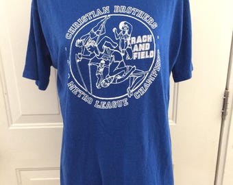 Vintage 1980's chrisitan brothers track and field tshirt. Size M/L ( mens)