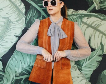 Suede Vest with Lion Clasp