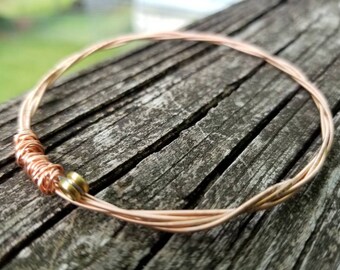 Recycled guitar string bracelet