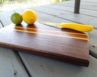Walnut, purpleheart and yellowheart cutting board