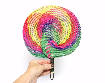 Colorful Woven Fan Made of Straw or Raffia in Hues of Pink, Yellow, Green, & Purple