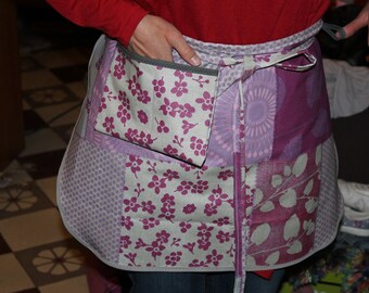 Purple coated canvas floral waitress apron