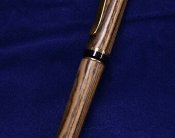 Cigar Pen hand made from Exotic Bacote Wood trimmed in Gold and Black - price reduced