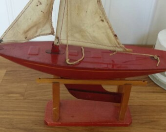 Tin toy pond yacht, sailing boat, red, Tri-ang toys, Lines bros. Ltd.