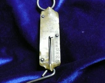 This is a Small, BRASS Hanging SCALE, by "CHATILLON", it is a Star 3. It was Made in the U. S. A. It weighs up to 25 pounds, 8 inch Scale