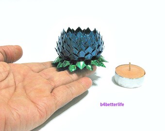 A piece of Small Size Blue Color Hand-folded Origami Lotus. (4D Glittering paper series).