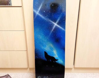 Spray painted skateboard deck - Howling wolf with galaxy back drop, personalised gift idea