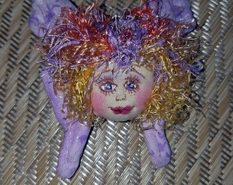 Whimsical, fiber sculpted butterfly fairy face pin, silk face
