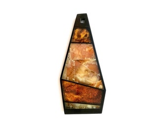 Pendant of amber and Gagat in abstract style