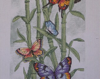 Embroidered butterflies on bamboo