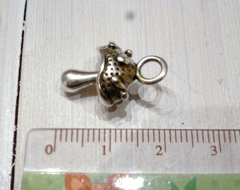 Silver mushroom charm
