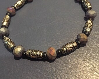 Iridescent and silver bracelet