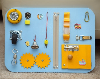 Busy Board. Activity board, early development Montessori educational toy.