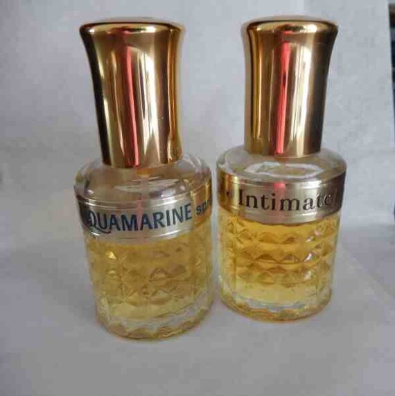 Revlon Aquamarine Mist or Revlon Intimate Spray Mist