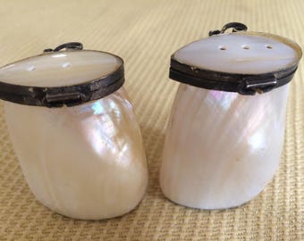 Rare HAND MADE Oyster shell collectible salt and pepper shaker set.