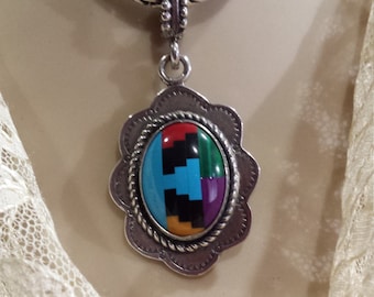Sterling silver native American inlaid assorted stones pendant