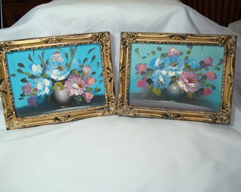 Two Vintage Acrylic Painted Blue and Pink Flowered Pictures in Gold and Black Frames.