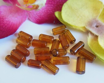 set of 20 glass tube shaped beads