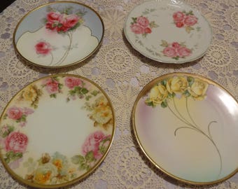 Four Tea Plates