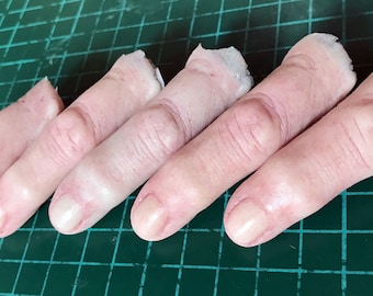 Severed silicone finger props, painted or unpainted. Realistic severed fingers perfect for film, TV, stage, cosplay and Halloween.