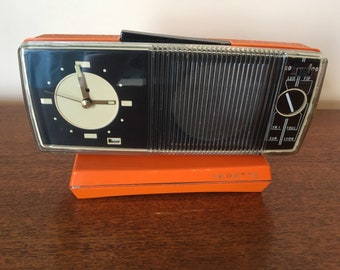 Radio alarm clock featuring orange 1970's