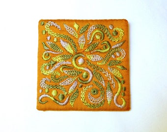 Brooch embroidered on silk