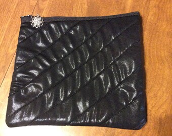 Mock snakeskin clutch