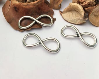4 infinity, curved, 8 or bow tie-shaped silver connectors