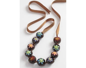 Hand painted Kukui beads on a ribbon necklace