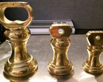 Set of Four Brass Weights Bell Shaped