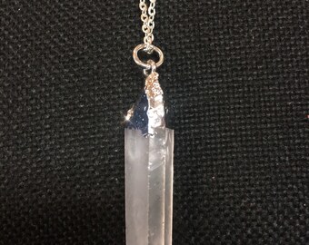 Silver capped quartz point necklace