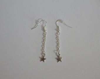 Silver earrings dangling stars