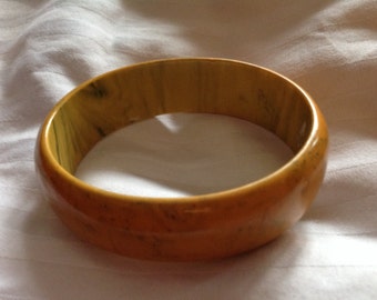 Vintage oval end of day yellow Bakelite bangle bracelet
