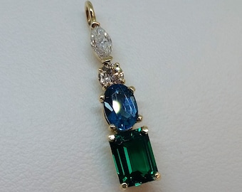 Emerald, London Blue Topaz, and Diamond Pendant