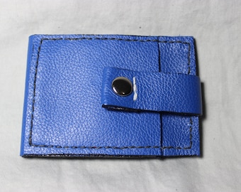 Blue, leather, slim, bi-fold wallet with snap closure.