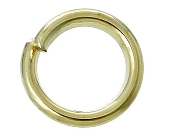 30 6 mm round golden rings.