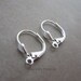 24 silver plated leverback ear wires with small shell