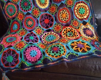 Kaleidoscope Blanket. Proceeds go to charity.