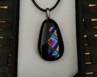 Black and dichroic glass pendant.