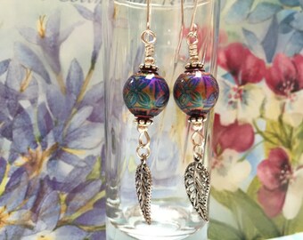 Mood bead earrings with silver leaf dangle.