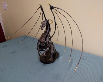 Metal Dragon Sculpture with gold highlights
