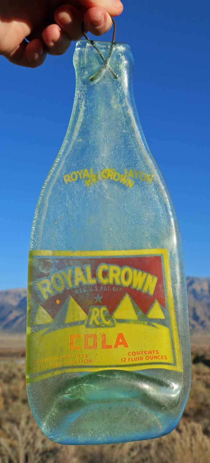 Royal Crown Cola bottle from 1936 melted flat