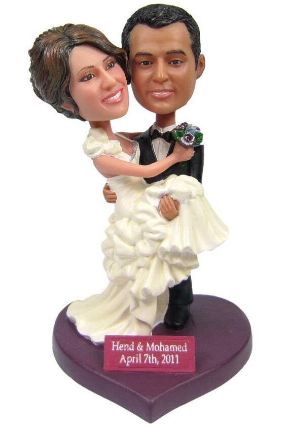 Wedding Cake toppers groom carrying bride