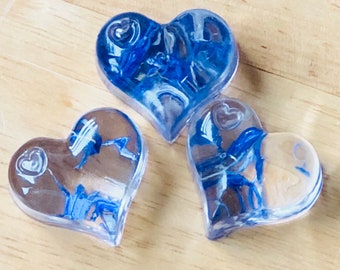 RESIN hearts with real blue petals embedded in resin . Gifts Birthdays Celebrations Anniversaries Friendship gift .